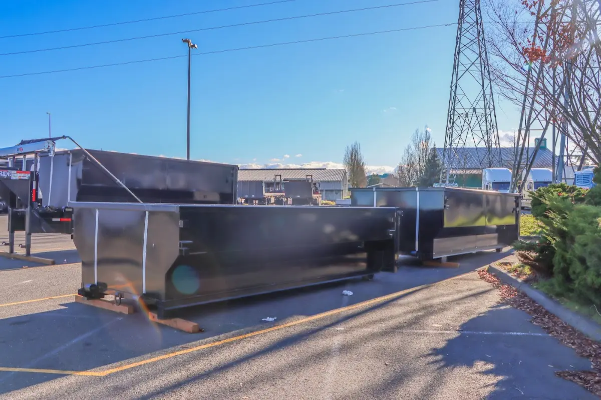 Roll-off dumpster ready for waste disposal at job site for 2 Yard Dumpster Rental in Carthage